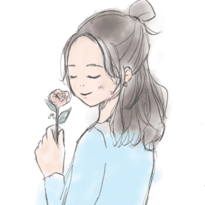 運営者の私のイメージ。セミロングをハーフアップにしている女性。手にお花を持っている